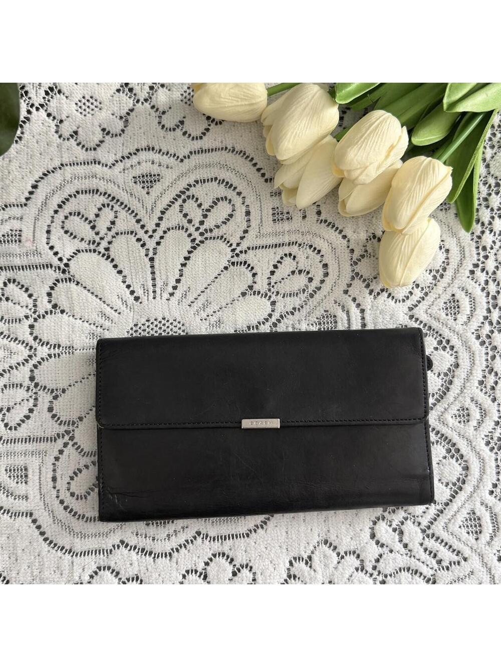 Coach black leather wallet with silver hardware